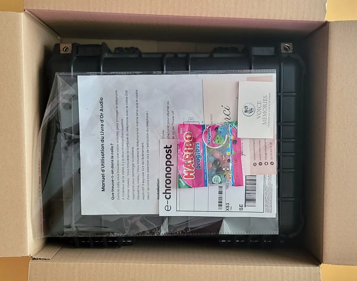 Voice Memories parcel ready to be closed, with case, instructions and label